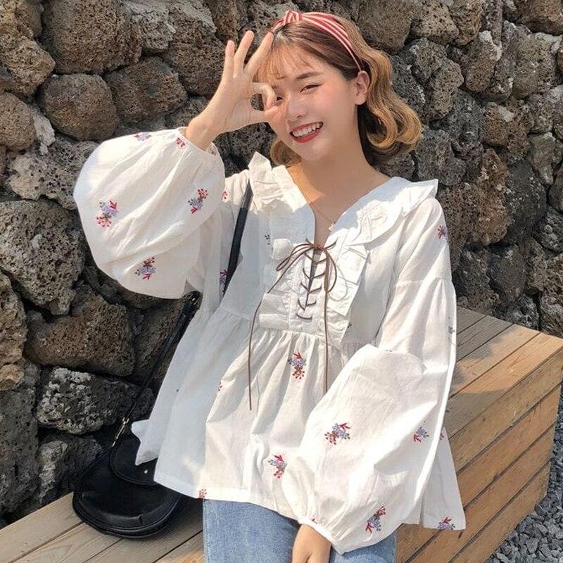 Ruffle Blouse With Floral Embroideries And Lace-Up