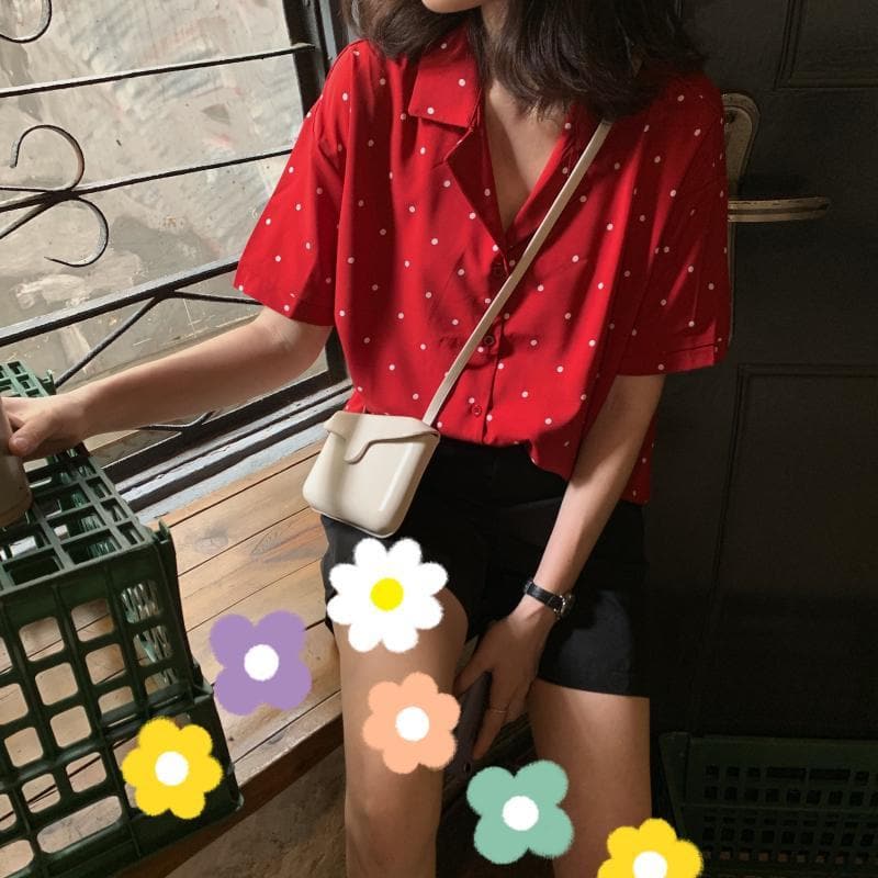 Shortsleeved Blouse With V-Neck And Polkadots
