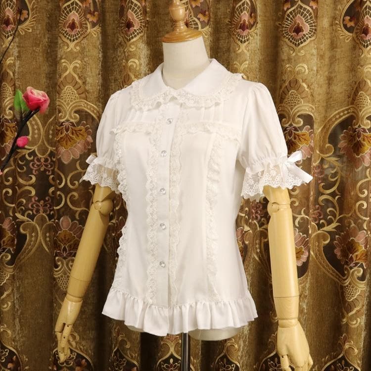Blouse With Lace Details And Detachable Sleeves